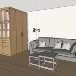 Interior Design des Wohnbereichs mit Couch und einem Eckschrank.